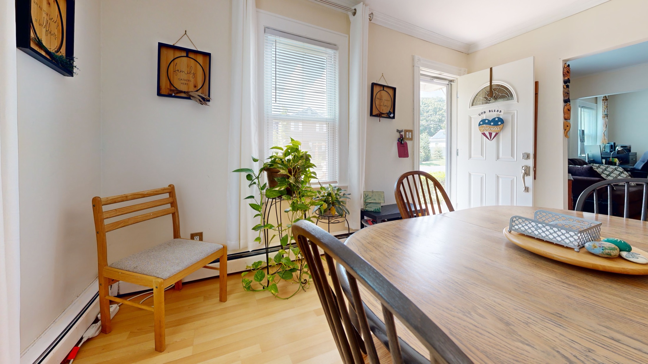 Dining room with sliders to the yard